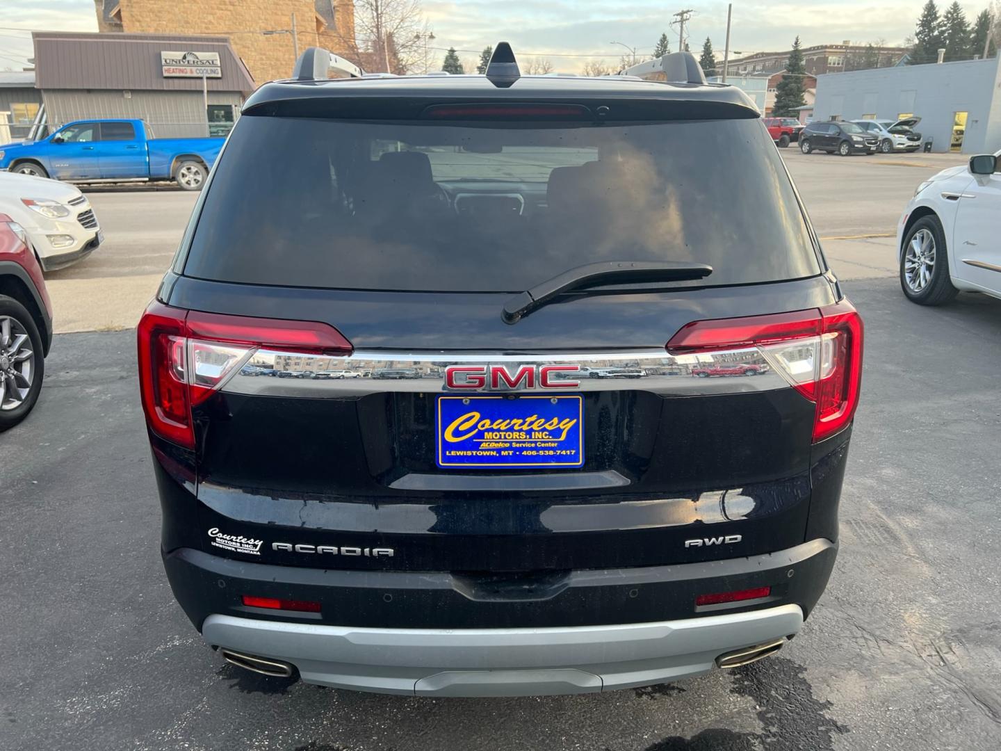 2021 Blue /Black GMC Acadia SLE (1GKKNRLS0MZ) with an 3.6L V6 DOHC 24V engine, automatic transmission, located at 116 5th Avenue South, Lewistown, MT, 59457, 47.063877, -109.427879 - Explore the Ultimate Adventure Companion: 2021 GMC Acadia SLE AWD! Key Features: All-Wheel Drive (AWD) - Conquer any terrain with confidence and control. Spacious Interior - Room for the whole family and then some! Advanced Safety Features - Drive with peace of mind wherever the road takes y - Photo#2